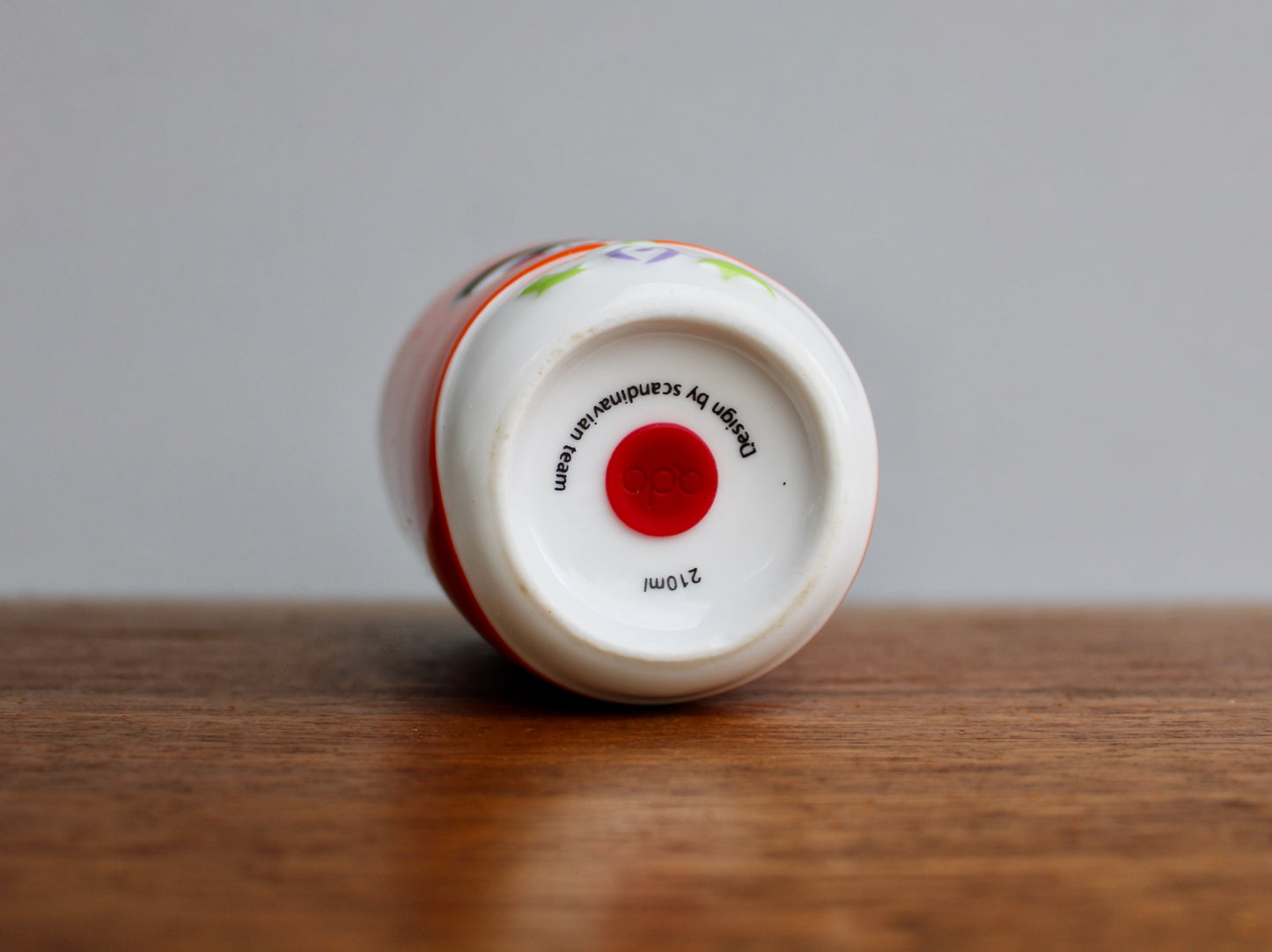 QDO Folklore Collection - 21st Century Benneton-Style Design Think-Tank - QDO (Copenhagen 2004) Quality Porcelain - Orange Variant Sofia Kokeshi Double-Walled Cup in Orange & Black