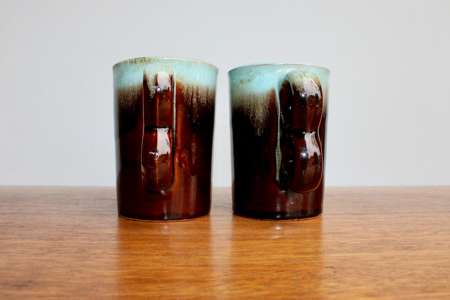 Pair of Evangeline Pottery Canada Trigger Mugs - Vintage Canuck Blue Mountain Style Reflowing Fat-Lava Technique - Crafted in Canada