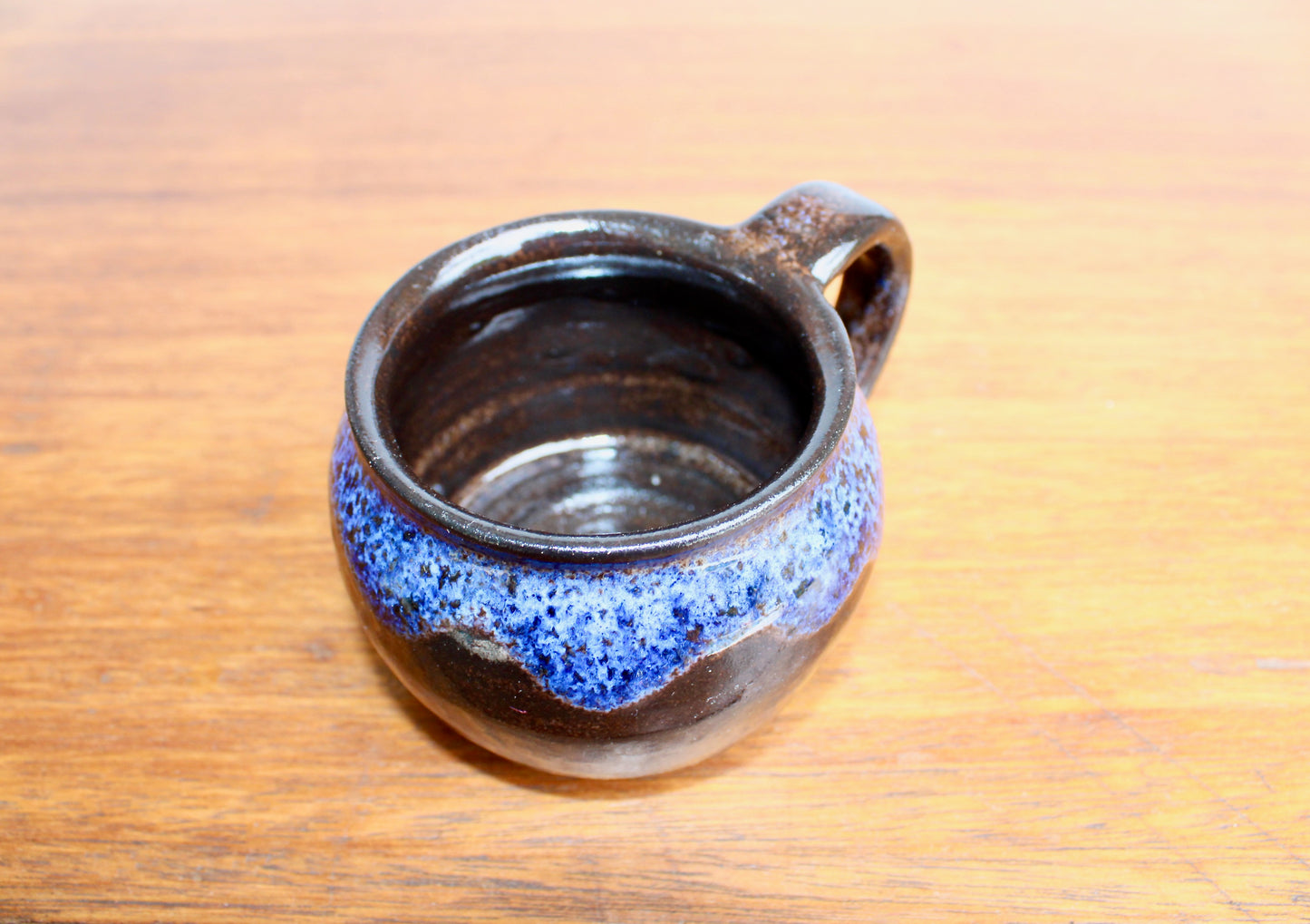 250ml Capacity Globe Mug, Dark Clay w/ Glassy Marbled Blue Glazed Rim-Drip Glaze, Dark Dark Stoneware Rounded Mug, Glossy Nearly Black Mug