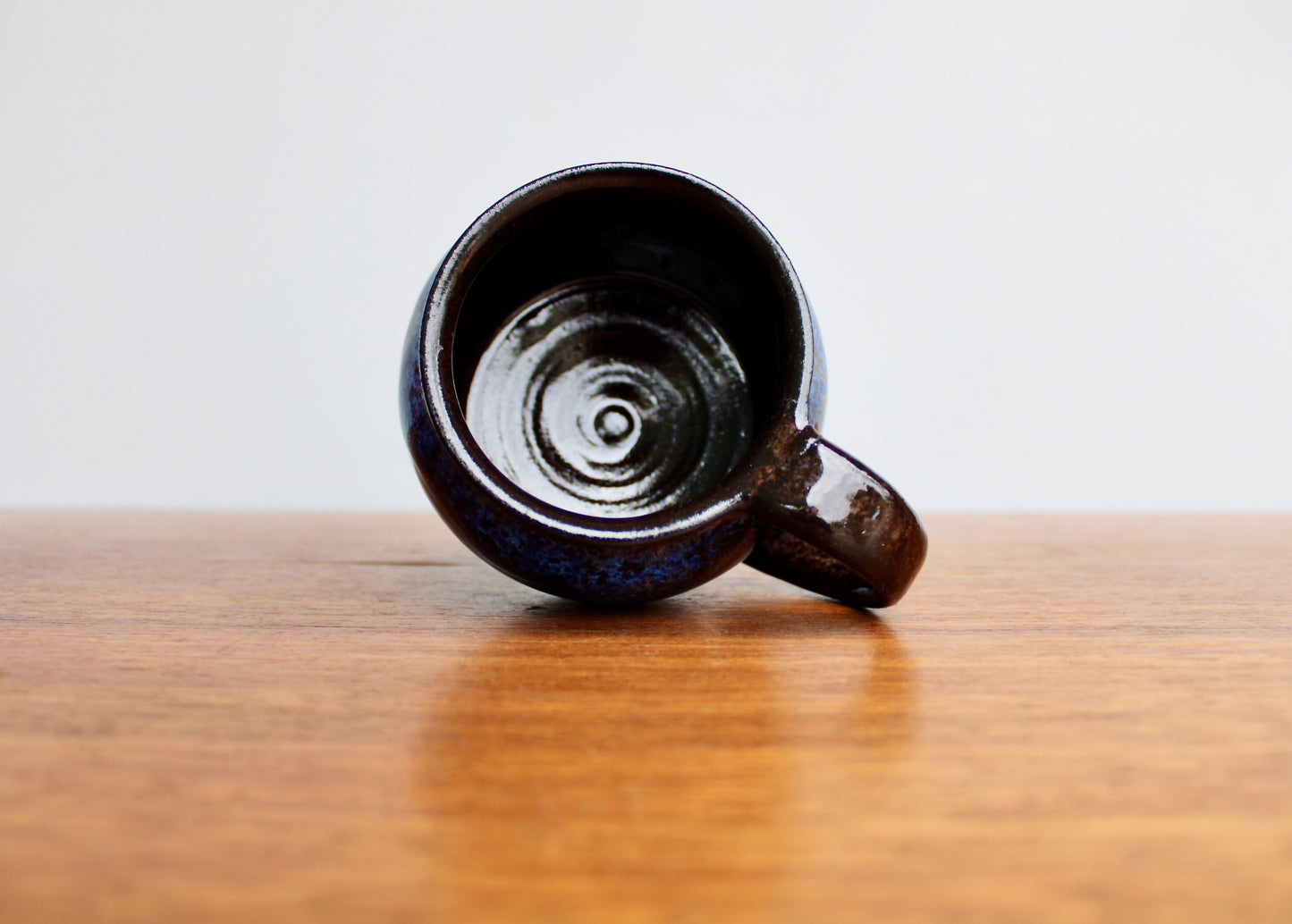 250ml Capacity Globe Mug, Dark Clay w/ Glassy Marbled Blue Glazed Rim-Drip Glaze, Dark Dark Stoneware Rounded Mug, Glossy Nearly Black Mug
