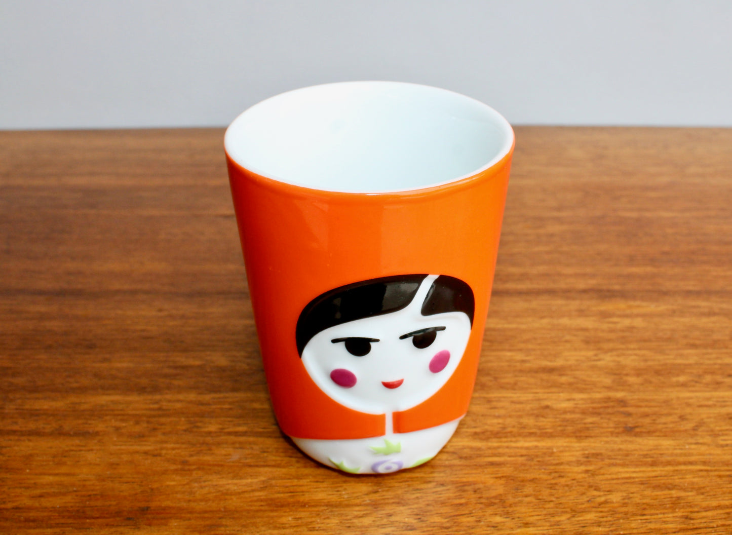 QDO Folklore Collection - 21st Century Benneton-Style Design Think-Tank - QDO (Copenhagen 2004) Quality Porcelain - Orange Variant Sofia Kokeshi Double-Walled Cup in Orange & Black
