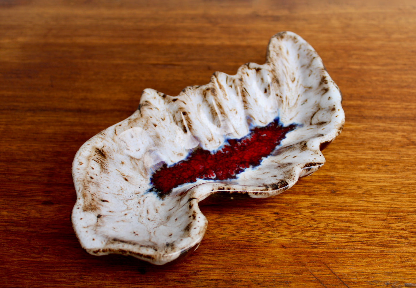 MCM California Pottery Biomorphic Shaped Ashtray in Rich Lava Glaze & Ruby Glass-Frit Interior Base