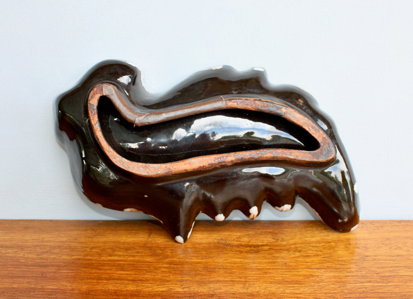 MCM California Pottery Biomorphic Shaped Ashtray in Rich Lava Glaze & Ruby Glass-Frit Interior Base