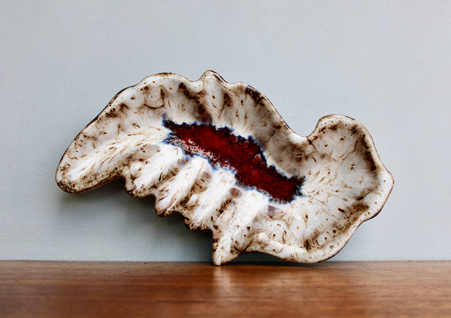 MCM California Pottery Biomorphic Shaped Ashtray in Rich Lava Glaze & Ruby Glass-Frit Interior Base