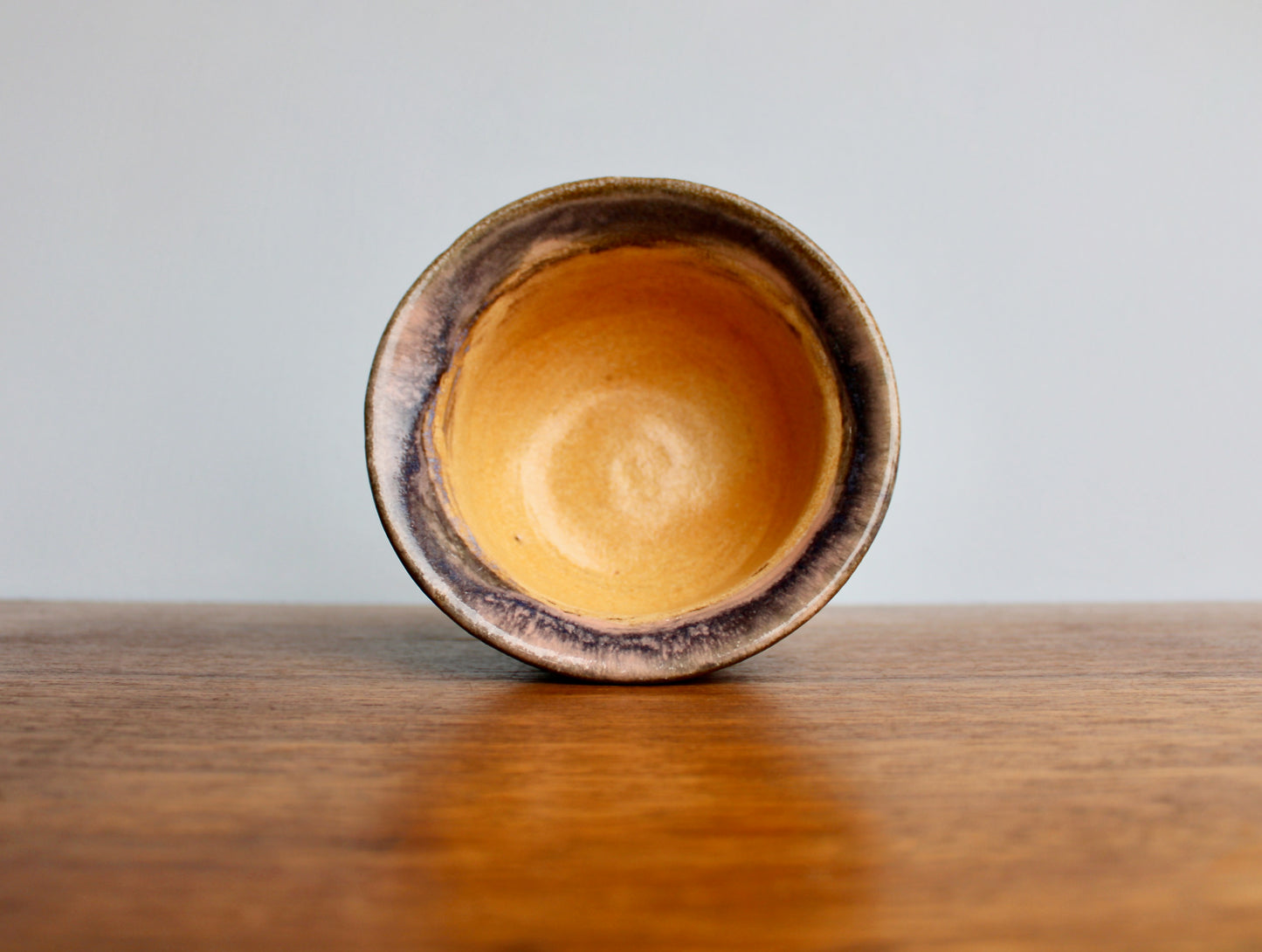 JK Pottery Stoneware Bowl - Crawling Matte Purple Exterior w/ Marbled Glossy Pink Rim & Orange-Yellow Interior - Vintage Handcrafted Studio Pottery